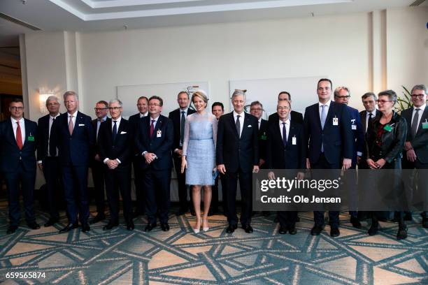 King Philippe and Queen Mathilde of Belgium pose during their meeting with the the Belgian trade delegation and their Danish counterparts at the...
