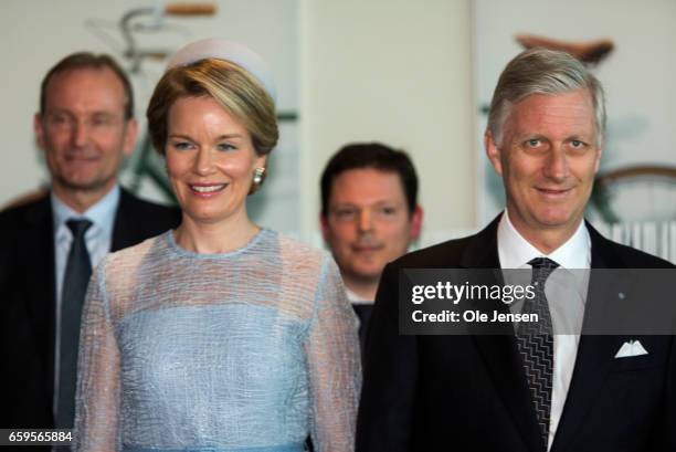 King Philippe and Queen Mathilde of Belgium pose during their meeting with the the Belgian trade delegation and their Danish counterparts at the...