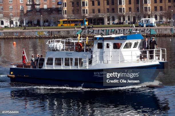 Small boat with King Philippe and Queen Mathilde as passengers and the Danish Crown Prince couple as tour guide through the channel of Copenhagen on...