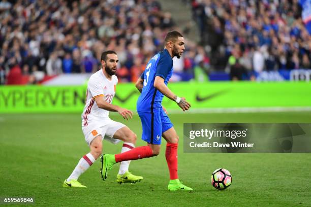 Layvin Kurzawa of France and Daniel Carvajal of Spain during the friendly match between France and Spain at Stade de France on March 28, 2017 in...