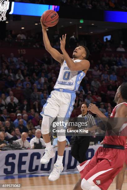 Nate Britt of the North Carolina Tar Heels goes to the basket against the Arkansas Razorbacks during the second round of the 2017 NCAA Men's...