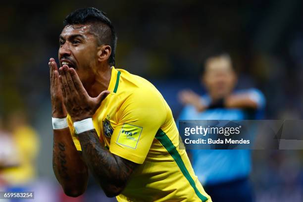 Paulinho of Brazil gestures during a match between Brazil and Paraguay as part of 2018 FIFA World Cup Russia Qualifier at Arena Corinthians on March...