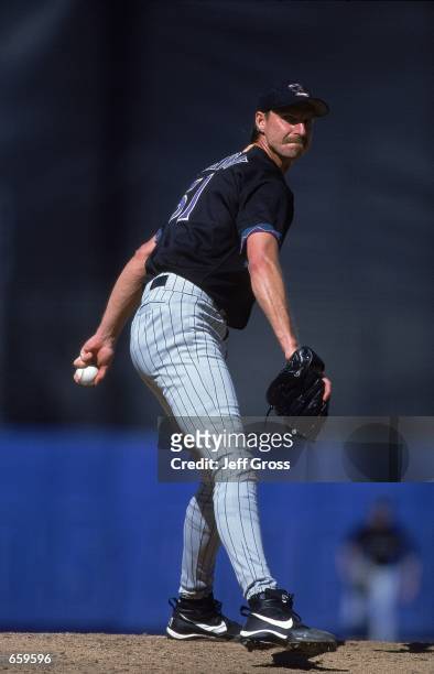 Pitcher Randy Johnson of the Arizona Diamondbacks winding up for the pitch during the game against the Los Angeles Dodgers at Dodger Stadium in Los...