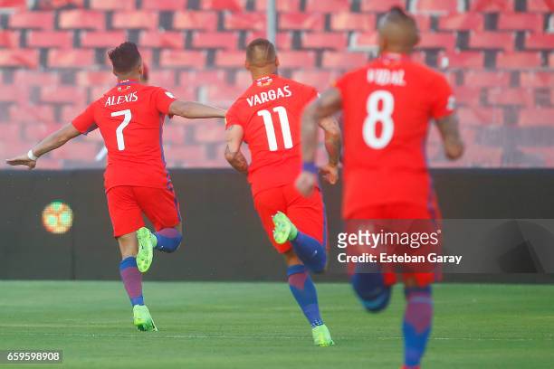 Alexis Sanchez of Chile celebrates after scoring the first goal of his team during a match between Chile and Venezuela as a part of FIFA 2018 World...