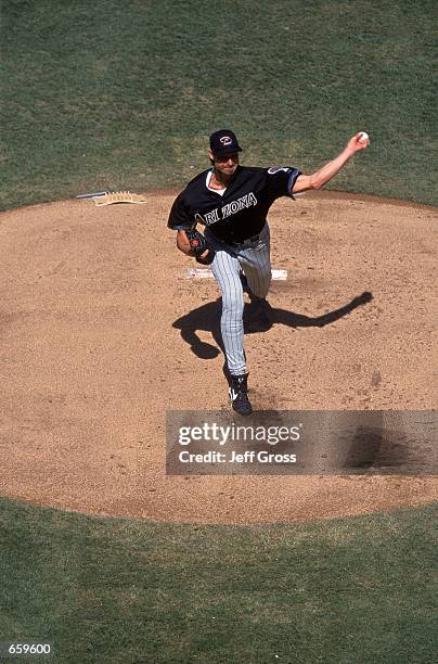 Pitcher Randy Johnson of the Arizona Diamondbacks pitches from the mound during the game against the Los Angeles Dodgers at Dodger Stadium in Los...