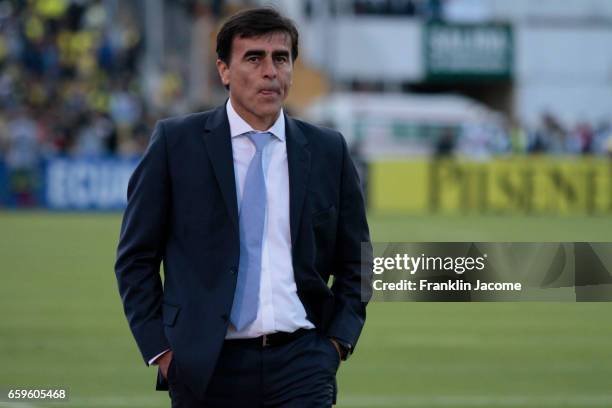 Gustavo Quinteros coach of Ecuador looks dejected after a match between Ecuador and Colombia as part of FIFA 2018 World Cup Qualifiers at Atahualpa...