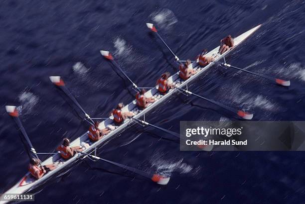 8 woman crew competitive rowing race. - rowing overhead stock pictures, royalty-free photos & images