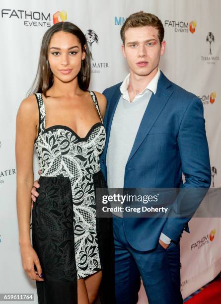 Actors Hannah Gottesman and Oliver Stark arrive for the Fathom Events And Terra Mater Film Studios Premiere Event For "MindGamers: One Thousand Minds...