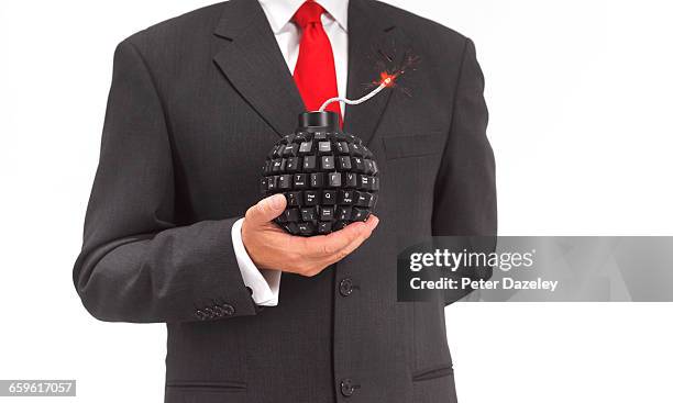 man in suit with bomb - bom stockfoto's en -beelden