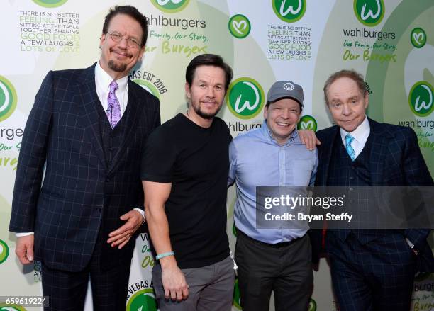 Penn Jillette of the magic/comedy team Penn & Teller, actor Mark Wahlberg and brother executive chef Paul Wahlberg and Teller of the magic/comedy...