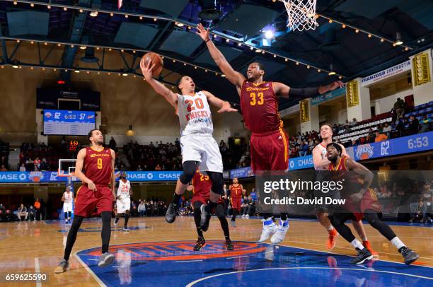 March 28: Travis Trice II of the Westchester Knicks shoots against Jonathan Holmes of the Canton Charge at the Westchester County Center on March 28,...