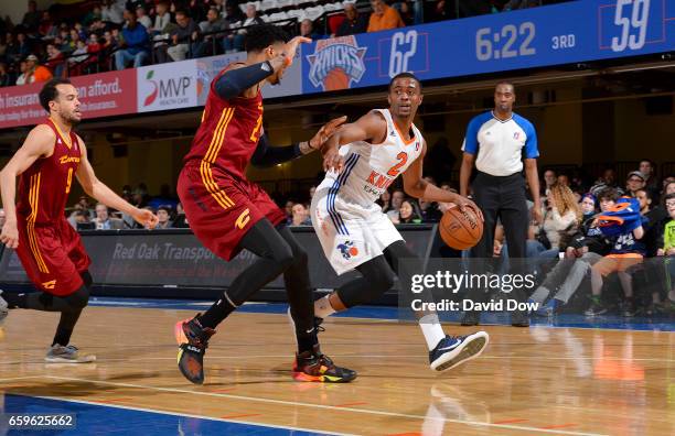 March 28: Doron Lamb of the Westchester Knicks dribbles against Eric Moreland of the Canton Charge at the Westchester County Center on March 28, 2017...