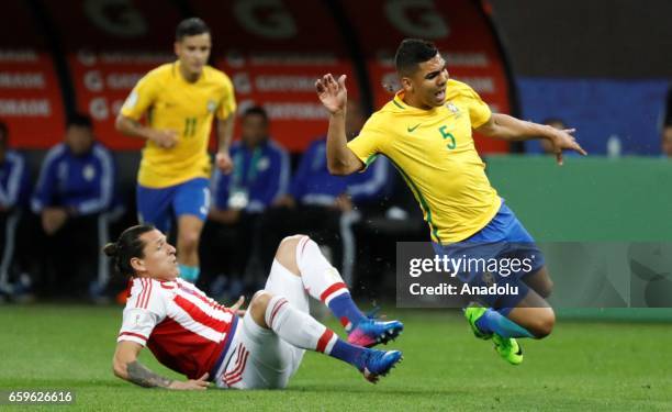 Brazil's Casemiro in action against Paraguay's Federico Santander during the 2018 FIFA World Cup Qualifying group match between Brazil and Paraguay...