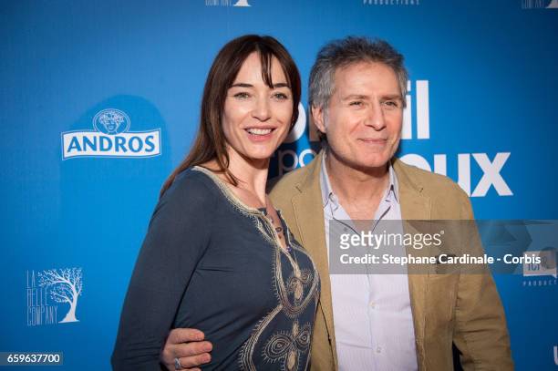 Delphine Rollin and Laurent Olmedo attend the 'Un Profil Pour Deux' Premiere at Cinema UGC Normandie on March 27, 2017 in Paris, France.
