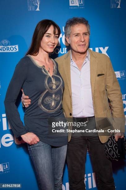 Delphine Rollin and Laurent Olmedo attend the 'Un Profil Pour Deux' Premiere at Cinema UGC Normandie on March 27, 2017 in Paris, France.