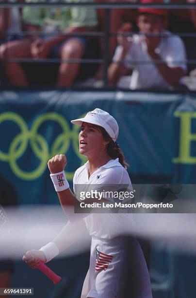 American tennis player Jennifer Capriati of the United States team pictured in action against Steffi Graf of Germany in the final to win the gold...