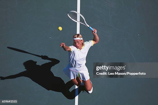 Czech born American tennis player Martina Navratilova pictured in action competing to reach the final of the 1991 US Open Women's Singles tennis...