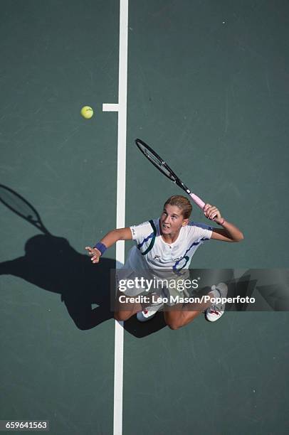 Yugoslavian tennis player Monica Seles pictured in action competing to reach the fourth round of the 1989 US Open Women's Singles tennis tournament...