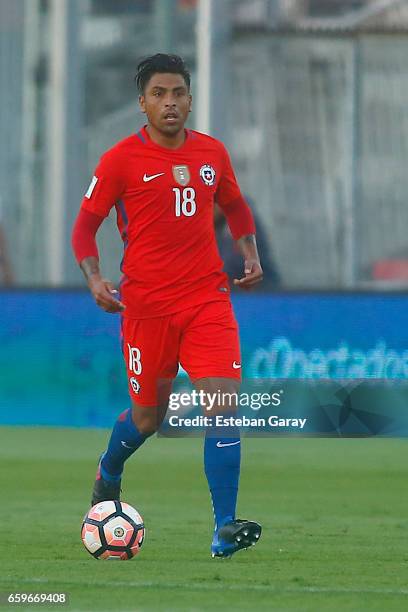 Gonzalo Jara of Chile drives the ball during a match between Chile and Venezuela as part of FIFA 2018 World Cup Qualifiers at Monumental Stadium on...