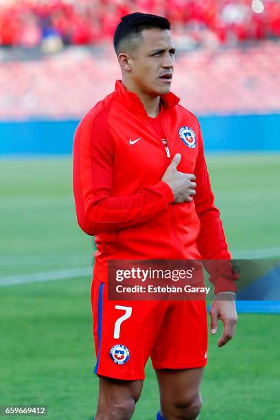 Alexis Sanchez of Chile sings the National Anthem during a match between Chile and Venezuela as part of FIFA 2018 World Cup Qualifiers at Monumental...