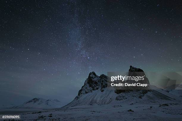 night time at the eystrahorn mountains in iceland - star of david bildbanksfoton och bilder