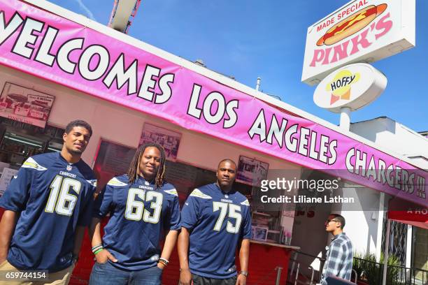 Wide Receiver Tyler Williams, Guard Donavon Clark and Tackle Chris Hairston attend the unveiling of the "Chargers Chilli Cheese" at Pink's Hot Dogs...