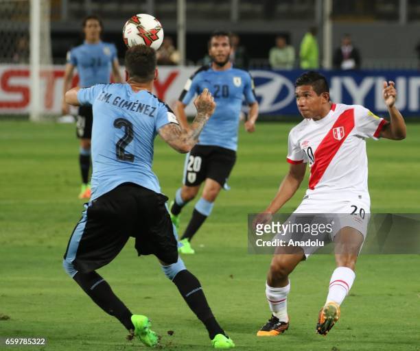 Edison Flores of Peru in action against Jose Gimenez of Uruguay during 2018 FIFA World Cup Qualification match between Peru and Uruguay at National...