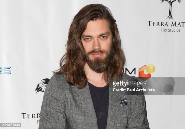 Actor Tom Payne attends the premiere for "MindGamers: One Thousand Minds Connected Live" at Regal LA Live Stadium 14 on March 28, 2017 in Los...