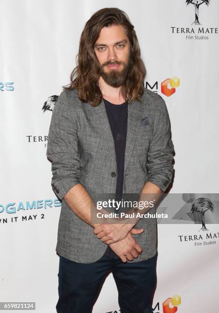 Actor Tom Payne attends the premiere for "MindGamers: One Thousand Minds Connected Live" at Regal LA Live Stadium 14 on March 28, 2017 in Los...