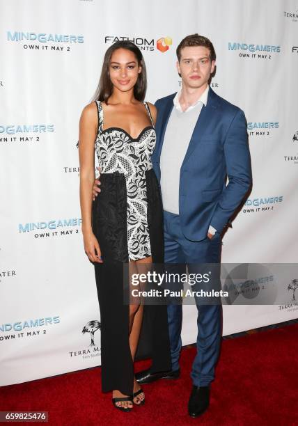 Actors Hannah Gottesman and Oliver Stark attend the premiere for "MindGamers: One Thousand Minds Connected Live" at Regal LA Live Stadium 14 on March...