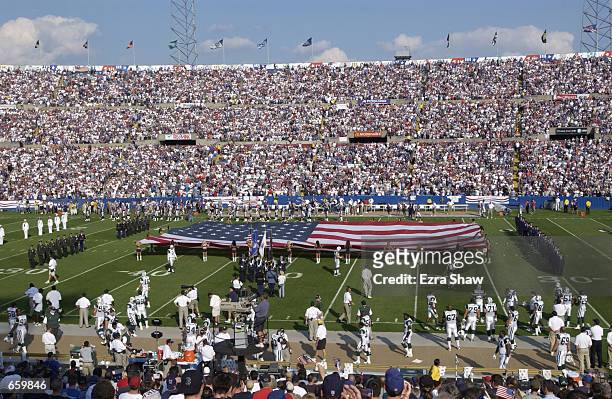 General view of Foxboro Stadium during a pregame ceremony honoring those fallen in the World Trade Center tragedy prior to the game between the New...