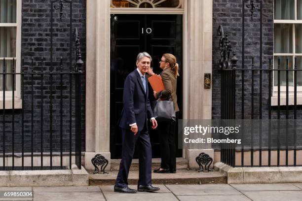Philip Hammond, U.K. Chancellor of the exchequer, arrives for a cabinet meeting at Downing Street in London, U.K., on Wednesday, March 29, 2017. The...