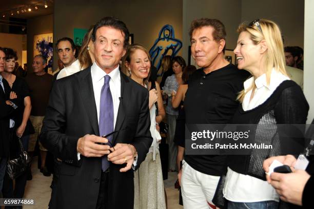 Sylvester Stallone, Steve Wynn and Andrea Hissom. Attend GALERIE GMURZYNSKA at Art Basel Miami Beach 2009 at Miami Beach Convention Center on...