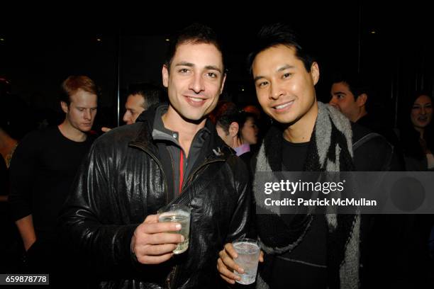 Louis Coraggio and Ray Yeung attend DAVID BARTON'S TOY DRIVE for Kids at Hospitals and Shelters In New York at David Barton Gym on December 21, 2009...