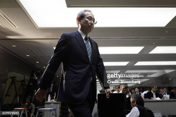 Satoshi Tsunakawa, president of Toshiba Corp., arrives for a news conference in Tokyo, Japan on Wednesday, March 29, 2017. Toshiba projected its...