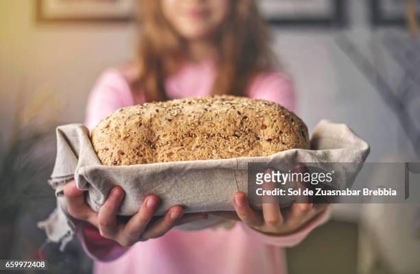 delicious freshly baked organic seed bread - exhibir stock-fotos und bilder