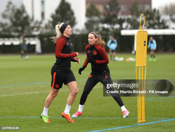 Manchester City's Tony Duggan and Kosovare Asllani during the training session at the City Football Academy, Manchester.