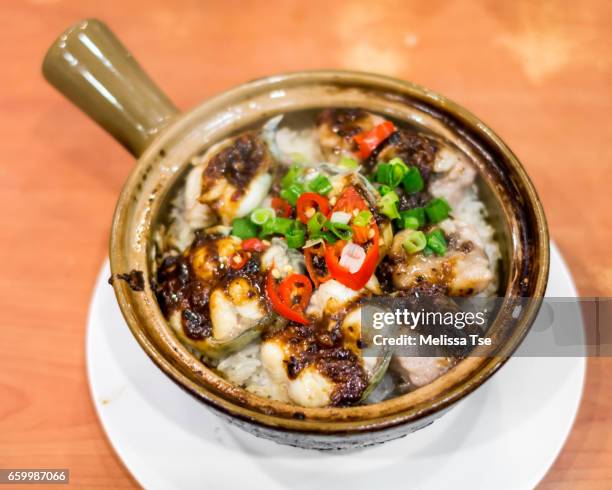 claypot rice with eel - claypot rice stock pictures, royalty-free photos & images