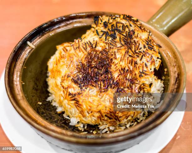 claypot rice crust - claypot rice stock pictures, royalty-free photos & images