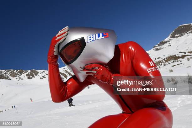 France's Simon Billy wears his helmet prior to perform speed skiing on the Chabriere ski slope in Vars, on March 29, 2017 / AFP PHOTO / JEAN-PIERRE...