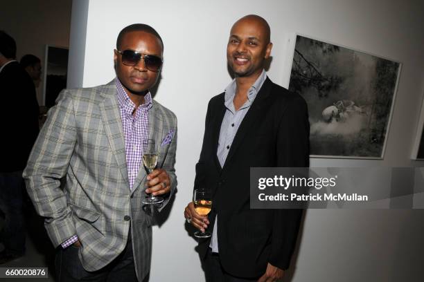 David McKnight and Eric Claiborne attend J.M. WESTON "Huemers" Exhibition at The Flag Art Foundation on May 13, 2009 in New York City.