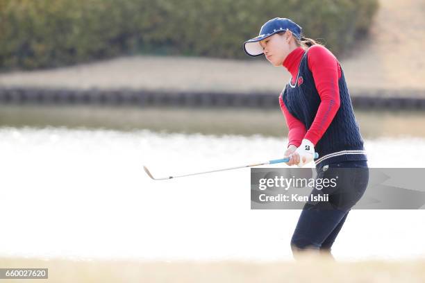 Eri Fukuyama plays a shot on the 18th hole in her playoff with Kurumi Dohi during the final round of the Rashink Nijinia/RKB Ladies at the Queens...