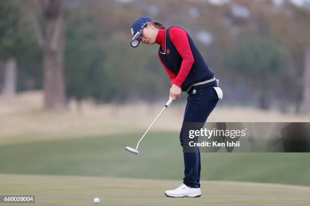 Eri Fukuyama putts on the 15th hole during the final round of the Rashink Nijinia/RKB Ladies at the Queens Hill Golf Club on March 29, 2017 in...