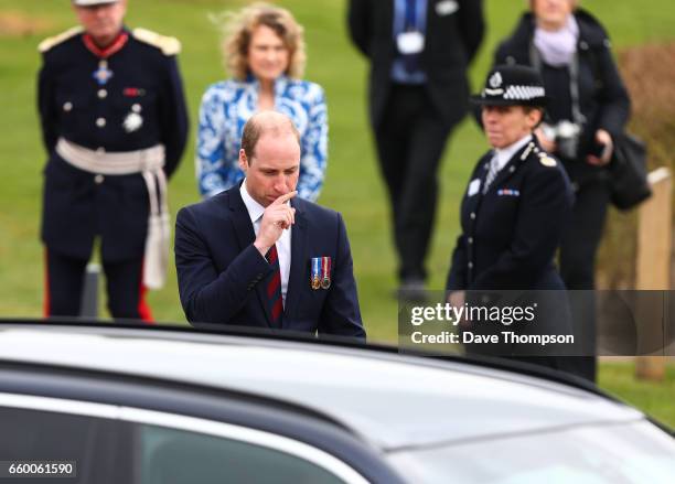 Prince William, Duke of Cambridge makes his way back to his car after laying a wreath at the the National Police Memorial following the official...