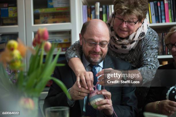 Martin Schulz, chairman of the Social Democratic Party of Germany , speaks to elderly residents during a visit to the multi-generational house...