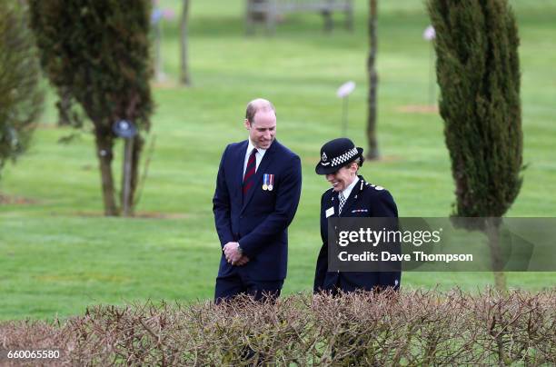 Prince William, Duke of Cambridge talks to Chief Constable of Staffordshire Police Jane Sawyers after laying a wreath at the the National Police...