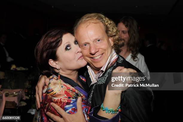 Carrie Fisher and Bruce Cohen attend CARRIE FISHER Hosts The Obama Pajama Party Benefiting The Pajama Program Charity at Ronald Reagan Building on...