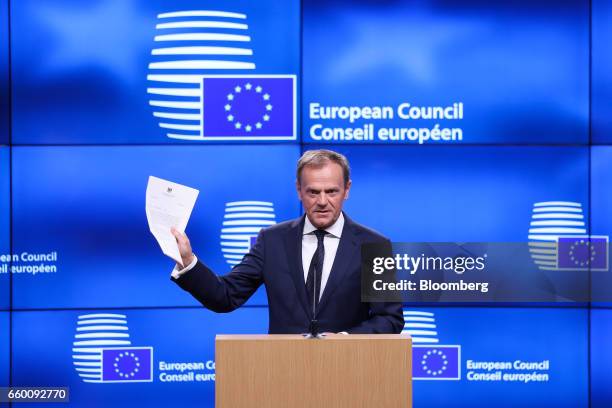 Donald Tusk, president of the European Union , holds the letter invoking Article 50 of the Lisbon Treaty from the U.K. Prime Minister as he speaks...