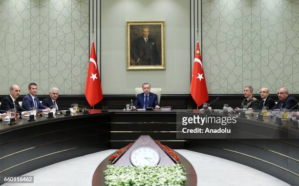 Turkish President Recep Tayyip Erdogan a meeting of National Security Council where Turkish Prime Minister Binali Yildirim and other MGK members...