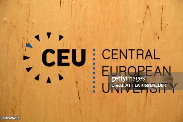 Logo of the Central European University is seen in Budapest on March 29, 2017. - The English-language CEU set up in Budapest by Hungarian born...